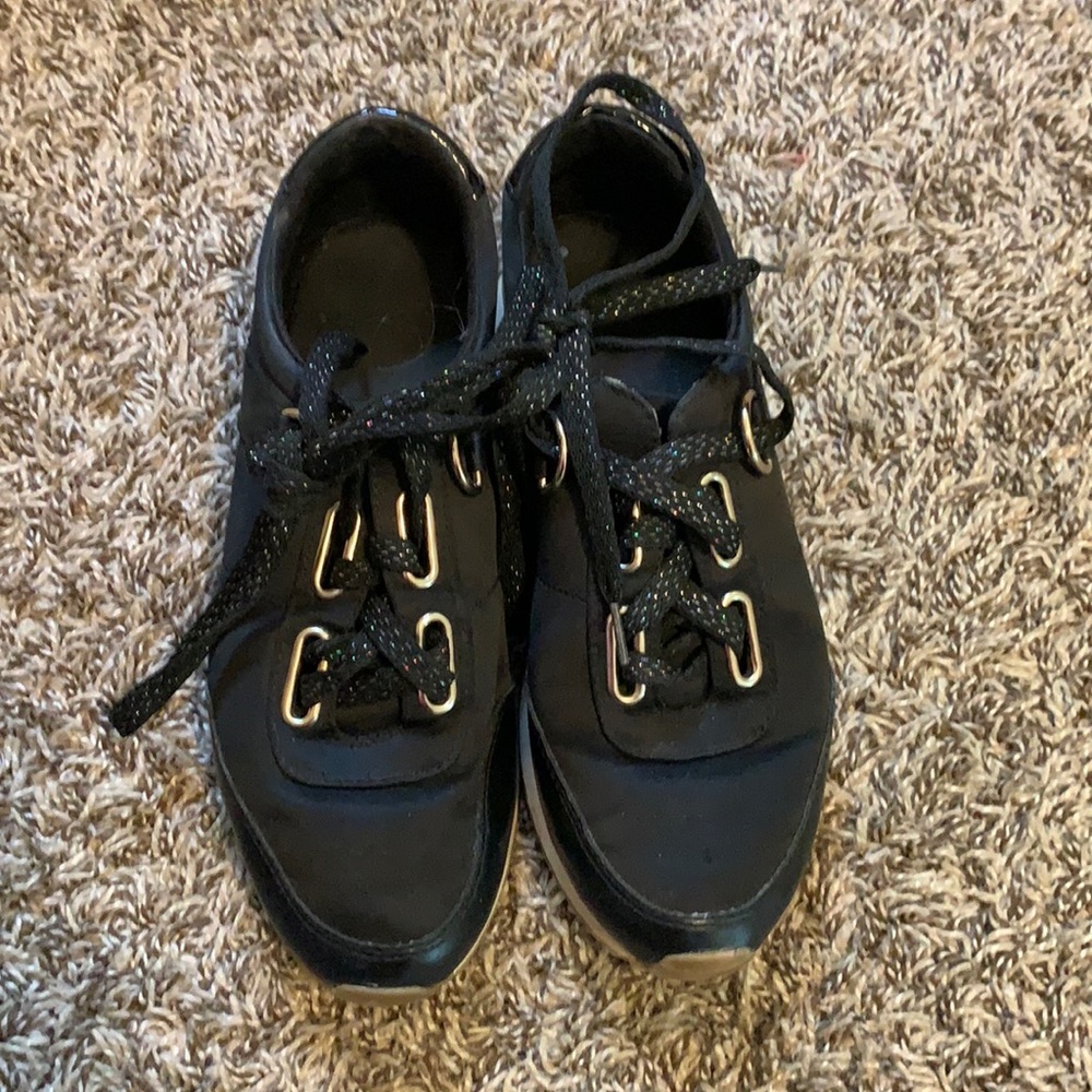 Black woman’s sneakers